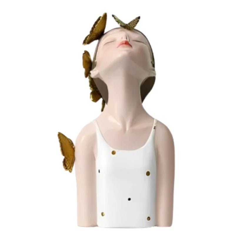 Bella Butterfly doll sculpture in polka dots